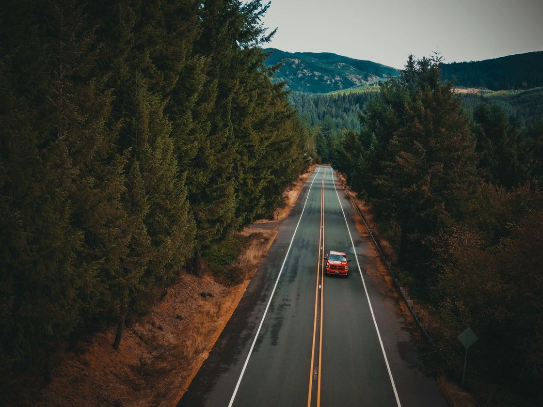 Car driving down a country road