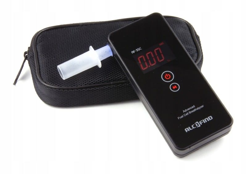AF-35C breathalyser with its carry case and mouthpiece