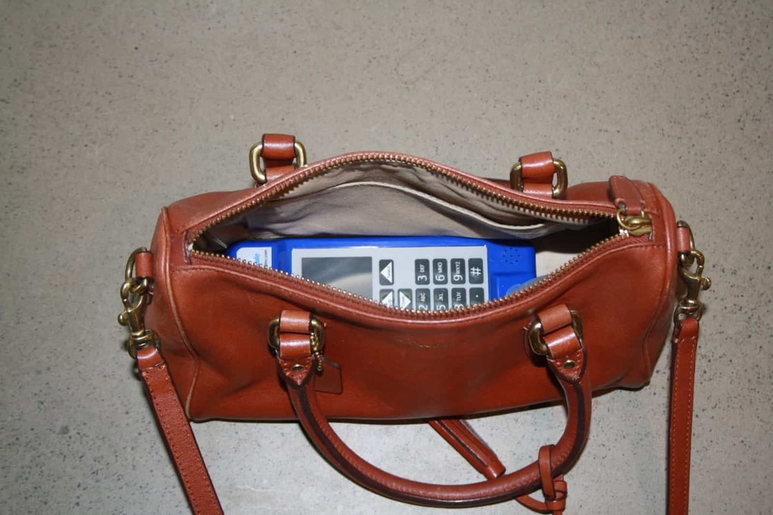 Smart Mobile device packed in a handbag