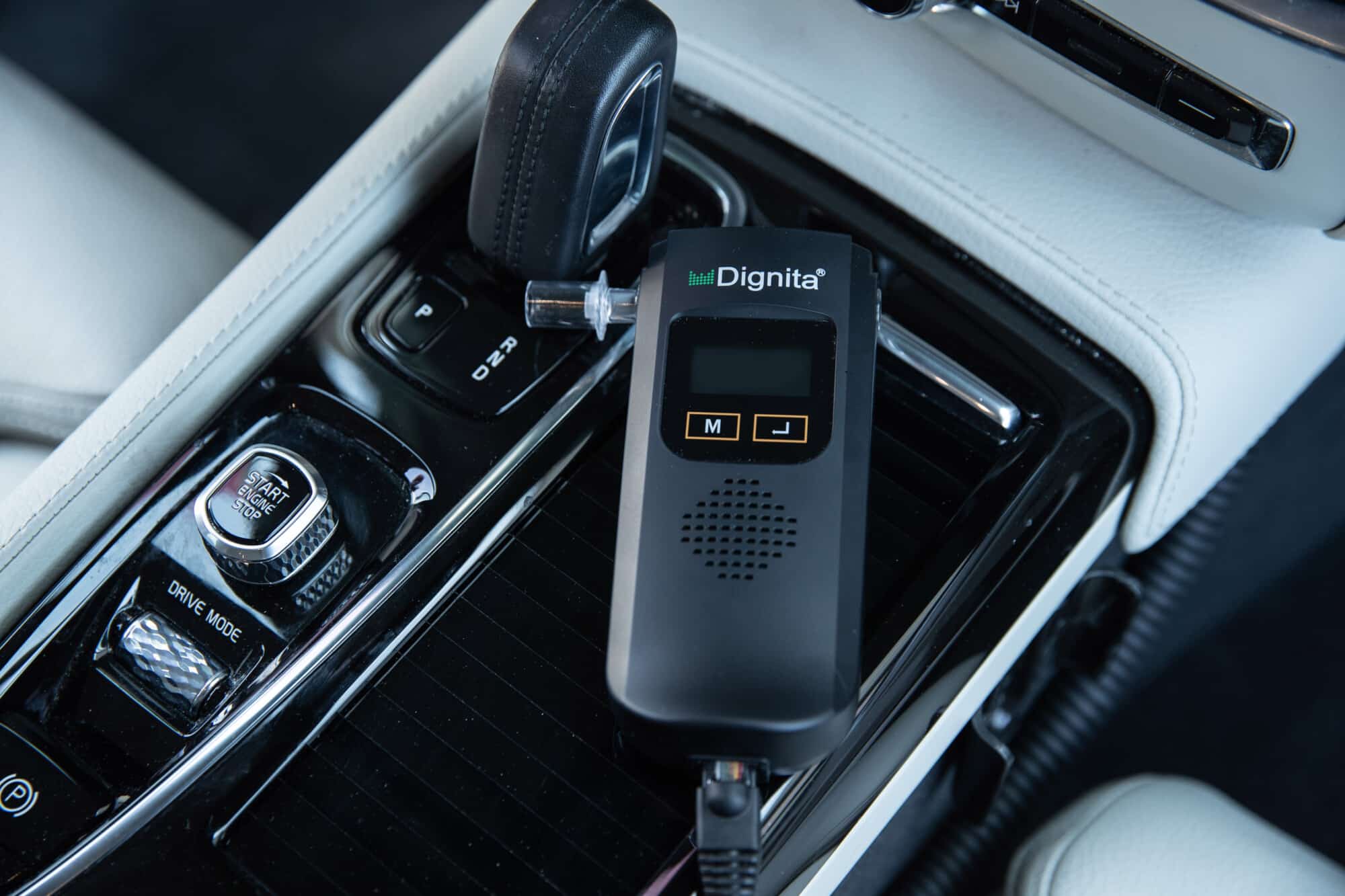 Dignita interlock handset in its car mount
